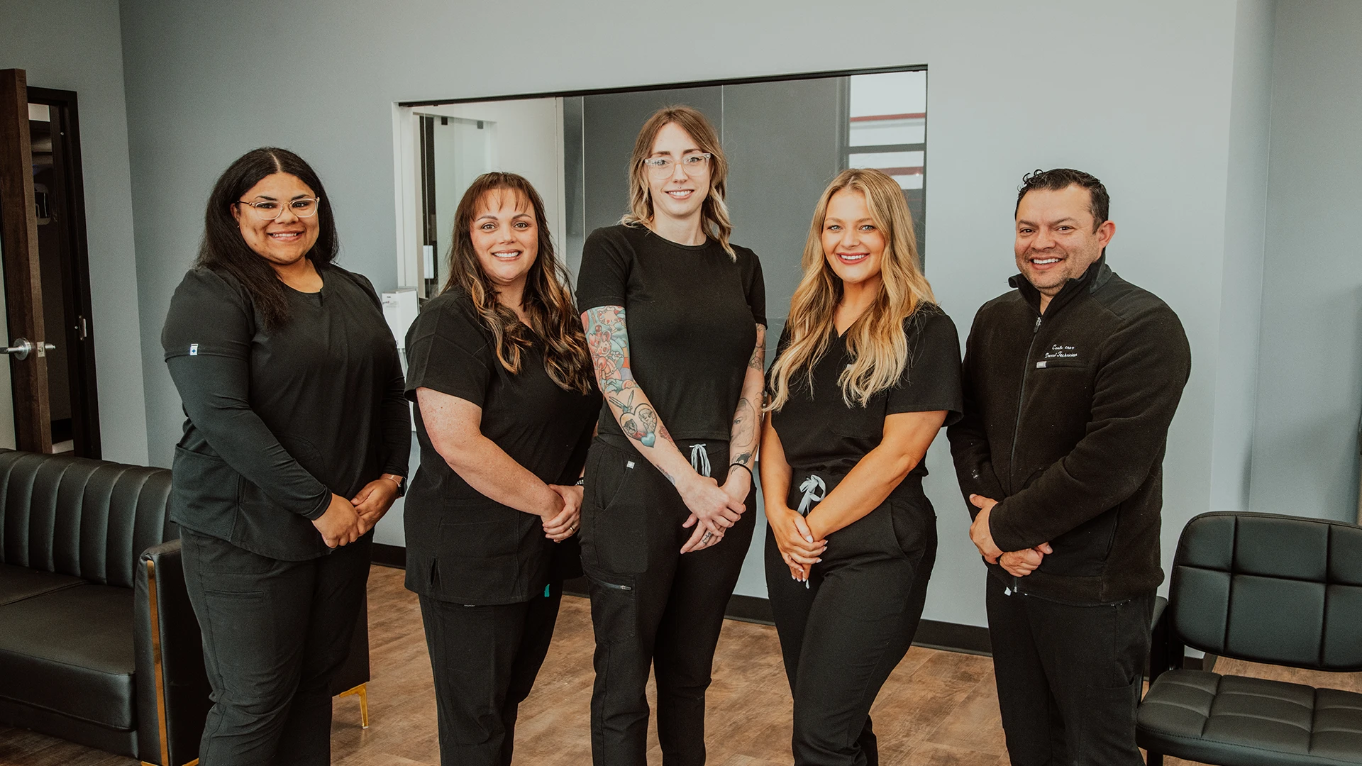Secure Dentures & Implants team